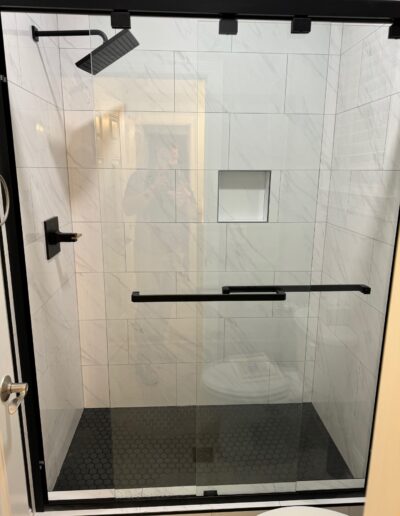 newly installed tile shower door