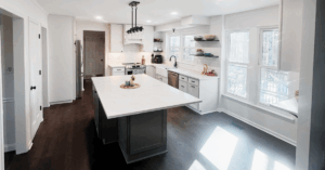 full kitchen remodel in indian trail nc featuring custom cabinets, quartz countertops, kitchen tile, lighting upgrades