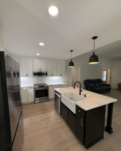 kitchen renovation with black accent hardware