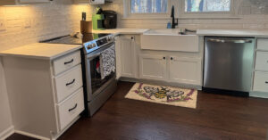 new kitchen cabinets and tile backsplash detail