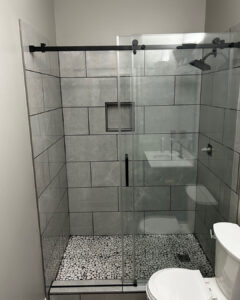 modern white shower tiles with niche shelf