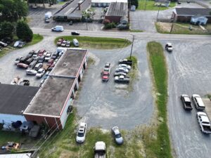 before aerial view of commercial parking lot